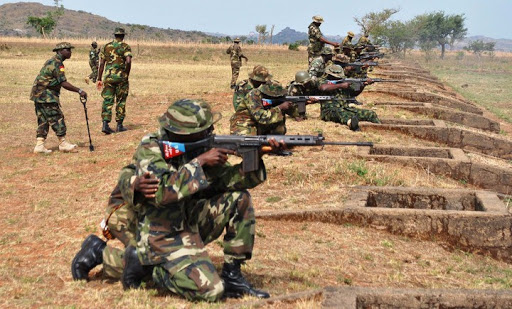 PIC. SOLDIERS OF 3 ARMOURED DIV., NIGERIA ARMY, PERFORMING RANGE CLASSIFICATION 

AT MIANGO RANGE IN JOS ON WEDNESDAY (10/4/13).