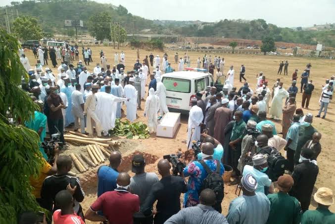  Presidency Aides, others shun social distancing at Abba Kyari’s burial