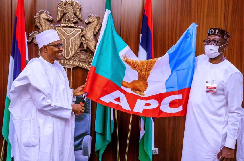  President Buhari presents APC flag to Edo Guber candidate, Ize-Iyamu in Aso Rock