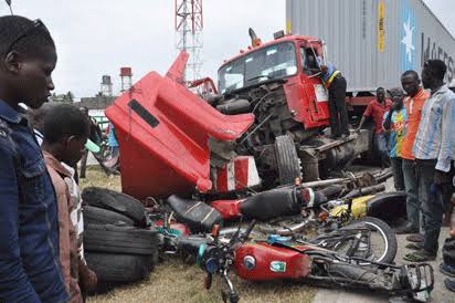  Motorcyclist, passenger riding against traffic crushed to death by truck in Mowe