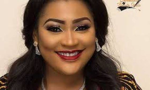  Actress Uche Ulendu cries out after her shop was looted by hoodlums