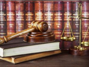 soundblock-Wood-scales-books-stack-background-leather