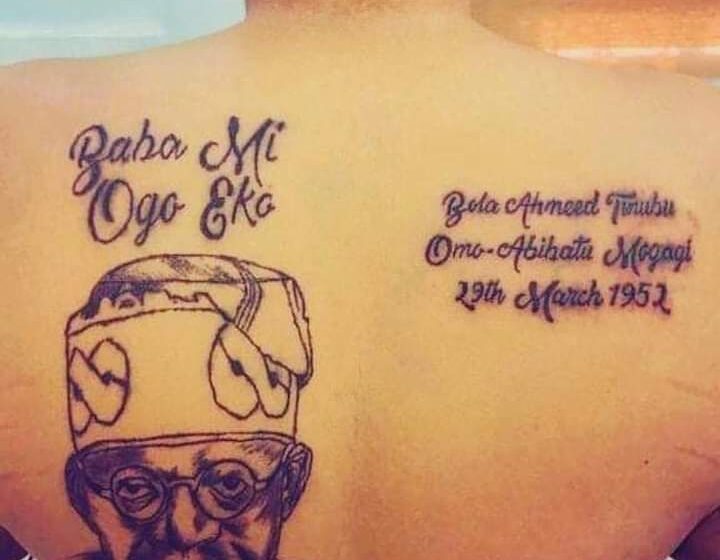  Woman tattoos Tinubu’s face on her back