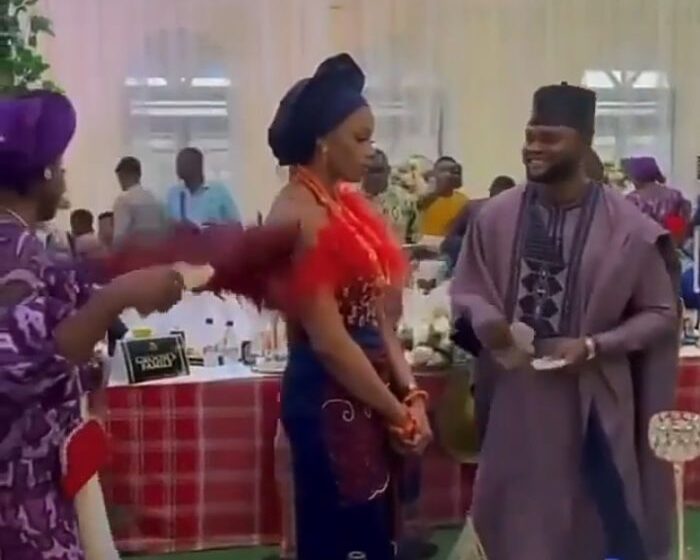 Bride refuses to smile on her wedding day as hubby showers money